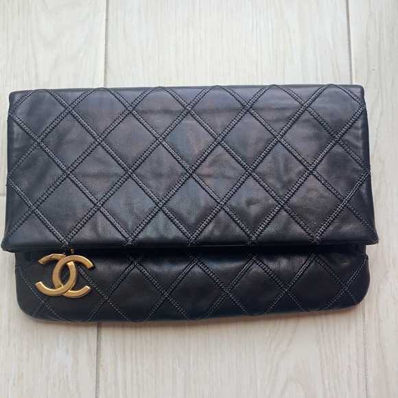 CHANEL Handbags - Chanel leather CC quilted foldover clutch